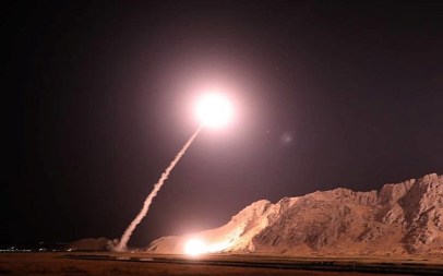 In this photo released on October 1, 2018, by the Iranian Revolutionary Guard Corps, a missile is fired from city of Kermanshah in western Iran targeting the Islamic State group in Syria. (Sepahnews via AP)
