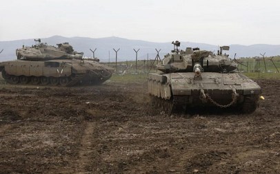 Israeli army Merkava tanks take positions on the Golan Heights, on January 20, 2019. (Jalaa Marey/AFP) Israeli army Merkava tanks take positions on the Golan Heights, on January 20, 2019. (Jalaa Marey/AFP)