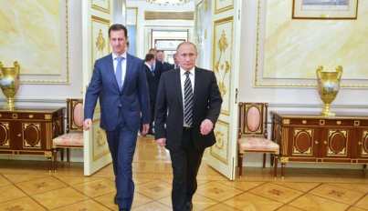 File Photo: Russian President Vladimir Putin greets his Syrian counterpart Bashar al-Assad upon his arrival for a meeting in Moscow, Russia, October 21, 2015. 