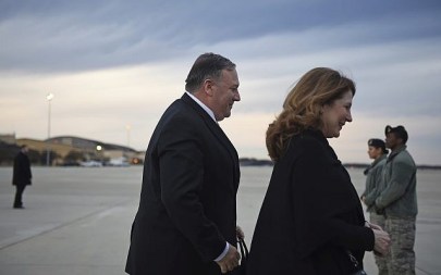 US Secretary of State Mike Pompeo and his wife Susan Pompeo walk to the plane prior to departing from Joint Base Andrews on January 7, 2019. (Andrew Caballero-Reynolds/Pool Photo via AP)