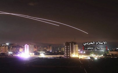 Illustrative: Missiles rise into the sky as Israel hits an air defense position and other military bases, in Damascus, Syria, May 10, 2018. (Syrian Central Military Media, via AP)