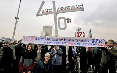 Iranians pose for a picture as they assemble with others during a ceremony celebrating the 40th anniversary of the Islamic Revolution held in the capital Tehran's Azadi (Freedom) square, February 11, 2019. (ATTA KENARE/AFP) Iranians pose for a picture as they assemble with others during a ceremony celebrating the 40th anniversary of the Islamic Revolution held in the capital Tehran's Azadi (Freedom) square, February 11, 2019. (ATTA KENARE/AFP)