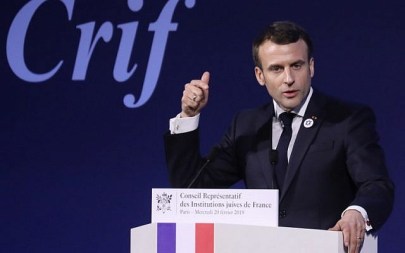 French President Emmanuel Macron speaks during the 34th annual dinner of the Representative Council of Jewish Institutions of France (CRIF - Conseil Representatif des Institutions juives de France) on February 20, 2019, at the Louvre Carrousel in Paris.  LUDOVIC MARIN / POOL / AFP)