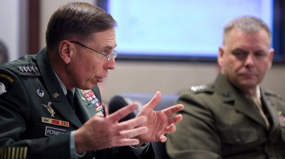 Retired General David Petraeus, left, gestures while talking with President Barack Obama meets and the national security team on Afghanistan and Pakistan, during a meeting in the Situation Room of the White House, May 6, 2010. Credit: Official White House Photo by Pete Souza.