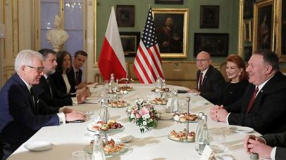 US officials, right, meet with Polish officials ahead of the conference (Photo: EPA)