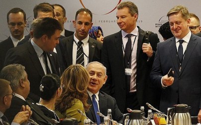Israeli Prime Minister Benjamin Netanyahu, center, arrives for a session at the conference on Peace and Security in the Middle East in Warsaw, Poland, Thursday, Feb. 14, 2019. (AP Photo/Czarek Sokolowski)