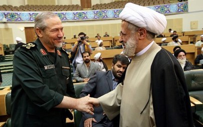 Commander-in-chief of Iran's Islamic Revolutionary Guards Corp, (IRGC) Major General Yahya Rahim Safavi, left, greets Sheikh Naim Qassem, deputy Secretary General of Lebanons Hezbollah, during a religious ceremony in Tehran, Iran, on August 18, 2007. (AP Photo/Hasan Sarbakhshian)