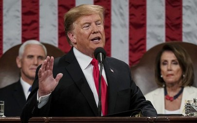 President Donald Trump gives his State of the Union address to a joint session of Congress, Tuesday, Feb. 5, 2019 at the Capitol in Washington, as Vice President Mike Pence, left, and House Speaker Nancy Pelosi look on. (Doug Mills/The New York Times via AP, Pool)