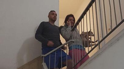 Israelis take cover in a stairwell as air raid sirens sound in the Tel Aviv area (Photo: Eliasaf Dauel)