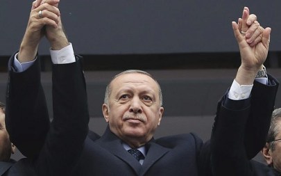 Turkey's President Recep Tayyip Erdogan waves to supporters during a rally in Giresun, Turkey, February 26, 2019. (Presidential Press Service via AP, Pool)