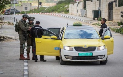 Israeli soldiers seen during a raid in the village of Bruqin near the West Bank town of Salfit on March 17, 2019, during searches for a Palestinian terrorist who shot and killed two near Ariel. (Flash90)