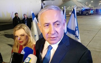 Prime Minister Benjamin Netanyahu, and his wife Sara, speaking to reporters before flying to Washington early on March 24, 2019. Raphael Ahren/Times of Israel)