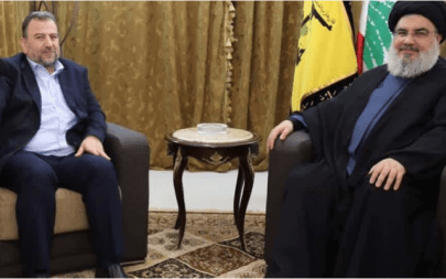 Hamas’s deputy political chief Saleh al-Arouri (left) holds a rare meeting with head of the Lebanese terror group leader Hassan Nasrallah in Beirut, Lebanon October 31, 2017. (Screenshot from PalInfo website)