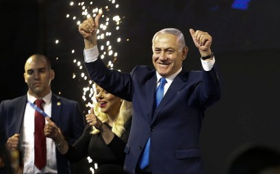 Prime Minister Benjamin Netanyahu waves to supporters at a victory event after polls for general elections closed in Tel Aviv,, April 9, 2019. (AP Photo/Ariel Schalit)