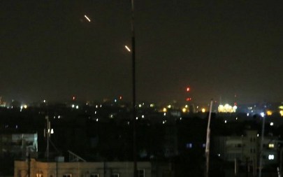 Illustrative: Rockets are fired from the Gaza Strip toward Israel on March 25, 2019. (Said Khatib/AFP)