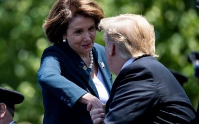 US President Donald Trump shakes hands with House Speaker Nancy Pelosi as they attend the 38th Annual National Peace Officers Memorial Service on May 15, 2019, in Washington, DC. (Photo by Brendan Smialowski / AFP)