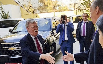 US National Security Adviser John Bolton, left, is greeted by Russian Security Council chairman Nikolai Patrushev in Moscow, Russia, October 22, 2018. (Press Service of the Russian Security Council via AP)