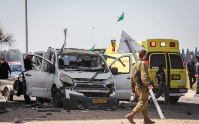 The scene of a car hit by a rocket fired from the Gaza Strip near the Israel-Gaza border on May 5, 2019. (Noam Rivkin Fenton/Flash90)