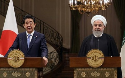 Iranian President Hassan Rouhani (R) Japanese Prime Minister Shinzo Abe give a joint press conference at the Saadabad Palace in Iran's capital Tehran on June 12, 2019. (AFP)
