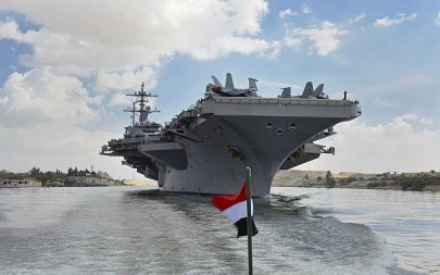 The USS Abraham Lincoln sails south in the Suez canal near Ismailia toward the Persian Gulf, May 9, 2019. (Suez Canal Authority via AP)