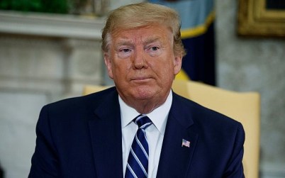 US President Donald Trump listens to a question during a meeting with Canadian Prime Minister Justin Trudeau in the Oval Office of the White House, June 20, 2019. (AP Photo/Evan Vucci)