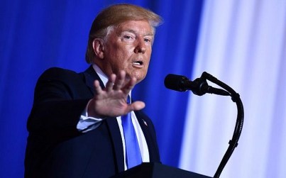 US President Donald Trump gestures, during a press conference on the sidelines of the G20 Summit in Osaka, Japan, on June 29, 2019. (Brendan Smialowski/AFP)