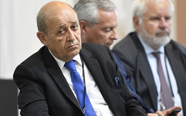 French Foreign Affairs Minister Jean-Yves Le Drian attends a French president's press conference in Biarritz, southwest France on August 26, 2019, on the third day of the annual G7 Summit attended by the leaders of the world's seven richest democracies, Britain, Canada, France, Germany, Italy, Japan and the United States. (Photo by Bertrand GUAY / AFP)