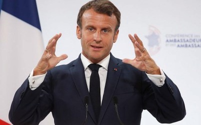 French President Emmanuel Macron gestures as he delivers a speech during the annual French ambassadors conference at the Elysee Palace in Paris on August 27, 2019. (Yoan VALAT / POOL / AFP)