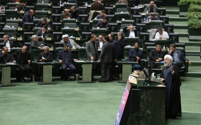 Iran's President Hassan Rouhani, right, speaks at parliament in the capital Tehran on September 3, 2019. (ATTA KENARE/AFP)