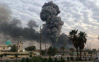 In this photo from August 12, 2019, plumes of smoke rise after an explosion at a military base southwest of Baghdad, Iraq. (AP Photo/Loay Hameed) In this photo from August 12, 2019, plumes of smoke rise after an explosion at a military base southwest of Baghdad, Iraq. (AP Photo/Loay Hameed)