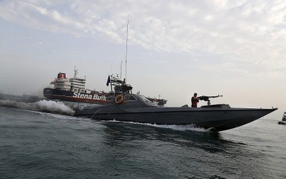 In this July 21, 2019 file photo, a speedboat of Iran's Revolutionary Guard moves around a British-flagged oil tanker, the Stena Impero, which was seized by the Guard, in the Iranian port of Bandar Abbas. (Hasan Shirvani/Mizan News Agency via AP, File) In this July 21, 2019 file photo, a speedboat of Iran's Revolutionary Guard moves around a British-flagged oil tanker, the Stena Impero, which was seized by the Guard, in the Iranian port of Bandar Abbas. (Hasan Shirvani/Mizan News Agency via AP, File)