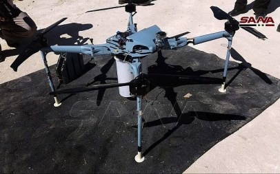 This photo released by the Syrian official news agency SANA shows a drone which the Syrian state news agency says authorities have controlled and dismantled and was rigged with cluster bombs on the edge of the Israeli Golan Heights, southern Syria, September 21, 2019. (SANA via AP) This photo released by the Syrian official news agency SANA shows a drone which the Syrian state news agency says authorities have controlled and dismantled and was rigged with cluster bombs on the edge of the Israeli Golan Heights, southern Syria, September 21, 2019. (SANA via AP)
