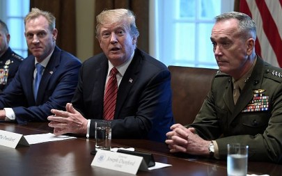 Illustrative: US President Donald Trump, center, flanked by acting Defense Secretary Patrick Shanahan, left, and Chairman of the Joint Chiefs of Staff Gen. Joseph Dunford, right, speaks during a meeting with military leaders in the Cabinet Room of the White House in Washington, Wednesday, April 3, 2019. (AP Photo/Susan Walsh)