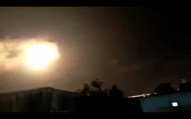 A burst of light, apparently caused by an Iron Dome interceptor missile detonating itself, illuminates the night sky over the northern Gaza Strip on September 11, 2019. (Screen capture: Twitter)