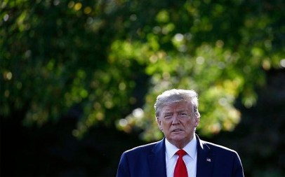 US President Donald Trump walks from the Oval Office to speak with reporters before departing on Marine One from the South Lawn of the White House, September 16, 2019, in Washington. (AP Photo/Patrick Semansky)