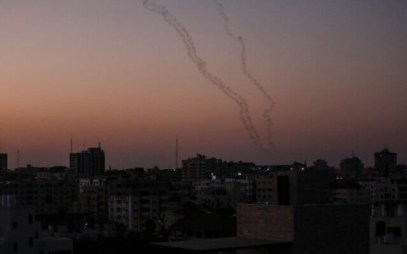 Palestinians fire rockets from Gaza City toward Israel on November 12, 2019. (Photo by MAHMUD HAMS / AFP)