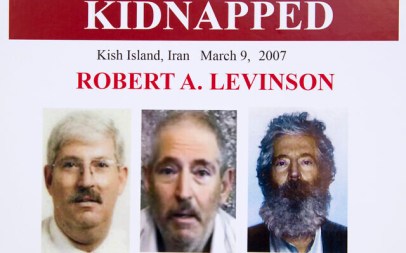 In this March 6, 2012, file photo, an FBI poster showing a composite image of former FBI agent Robert Levinson, right, of how he would look like now after five years in captivity, and an image, center, taken from the video, released by his kidnappers, and a picture before he was kidnapped, left, displayed during a news conference in Washington.  (AP Photo/Manuel Balce Ceneta)