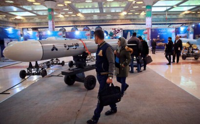 Visitors look at a Hoveizeh 8 cruise missile at a military show marking the 40th anniversary of Iran's Islamic Revolution in Tehran, Iran, February 3, 2019.  (AP/Vahid Salemi)