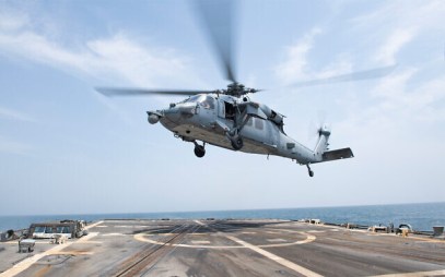 A US military helicopter takes off from the flight deck of the Arleigh  destroyer USS Mason in the Persian Gulf, May 22, 2019. (U.S. Navy photo by Mass Communication Specialist 3rd Class Lasheba James/Released)