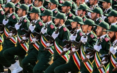 In this photo from September 22, 2018, members of Iran's Islamic Revolutionary Guard Corps (IRGC) march during the annual military parade marking the anniversary of the outbreak of the devastating 1980-1988 war with Saddam Hussein's Iraq, in the capital Tehran. (Stringer/AFP)