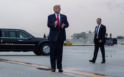 US President Donald Trump pauses as he arrives at Miami International Airport en route to attend the Republican National Committee winter meetings, Thursday, January 23, 2020, in Miami. (AP/ Evan Vucci)