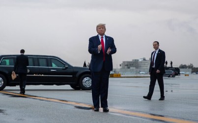 US President Donald Trump arrives at Miami International Airport en route to attend the Republican National Committee winter meetings, January 23, 2020. (AP/Evan Vucci) US President Donald Trump arrives at Miami International Airport en route to attend the Republican National Committee winter meetings, January 23, 2020. (AP/Evan Vucci)
