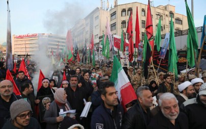 Mourners attend a funeral ceremony for Iranian Gen. Qassem Soleimani and his comrades, who were killed in Iraq in a U.S. drone strike on Friday, at the Enqelab-e-Eslami (Islamic Revolution) square. in Tehran, Iran, Jan. 6, 2020. (AP Photo/Ebrahim Noroozi)