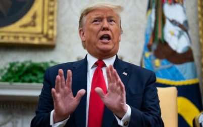 US President Donald Trump speaks during a meeting with Ecuadorian President Lenin Moreno in the Oval Office of the White House, February 12, 2020, in Washington. (AP Photo/Evan Vucci)
