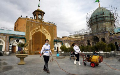 Workers disinfect the shrine of the Shiite Saint Imam Abdulazim to help prevent the spread of the new coronavirus in Shahr-e-Ray, south of Tehran, March, 7, 2020. (AP Photo/Ebrahim Noroozi)