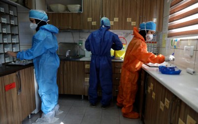 In this Tuesday, June 16, 2020, photo, nurses prepare medicines for COVID-19 patients at the Shohadaye Tajrish Hospital in Tehran, Iran. (AP Photo/Vahid Salemi) In this Tuesday, June 16, 2020, photo, nurses prepare medicines for COVID-19 patients at the Shohadaye Tajrish Hospital in Tehran, Iran. (AP Photo/Vahid Salemi)