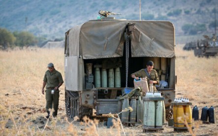 Israeli army forces seen stationed near the border between Israel and Lebanon in the Golan Heights on July 27, 2020. (David Cohen/Flash90)