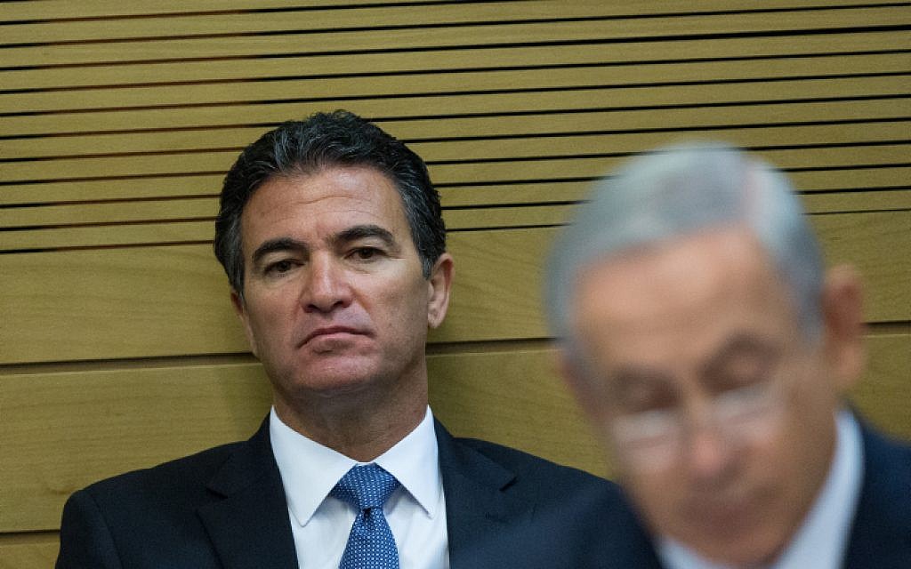 Yossi Cohen, then the national security adviser, is seen in a committee meeting at the Israeli parliament on December 8, 2015, sitting behind Prime Minister Benjamin Netanyahu. (Yonatan Sindel/Flash90) Yossi Cohen, then the national security adviser, is seen in a committee meeting at the Israeli parliament on December 8, 2015, sitting behind Prime Minister Benjamin Netanyahu. (Yonatan Sindel/Flash90)