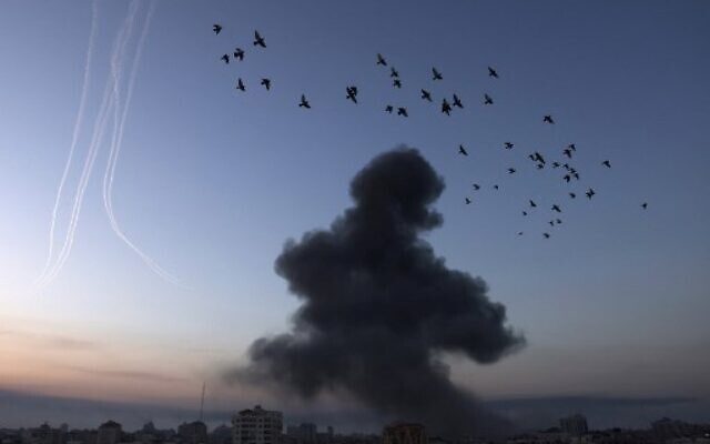 Smoke rises after a series of Israeli air strikes in Gaza City , early on May 12, 2021. (MOHAMMED ABED / AFP)