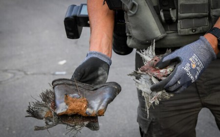 A rocket fired from the Gaza Strip that directly struck an apartment building in Ashkelon on May 11, 2021. (Flash90)